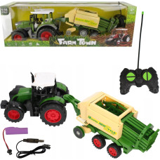 TRAKTOR Z MASZYNĄ NA RADIO Z ŁADOWARKĄ